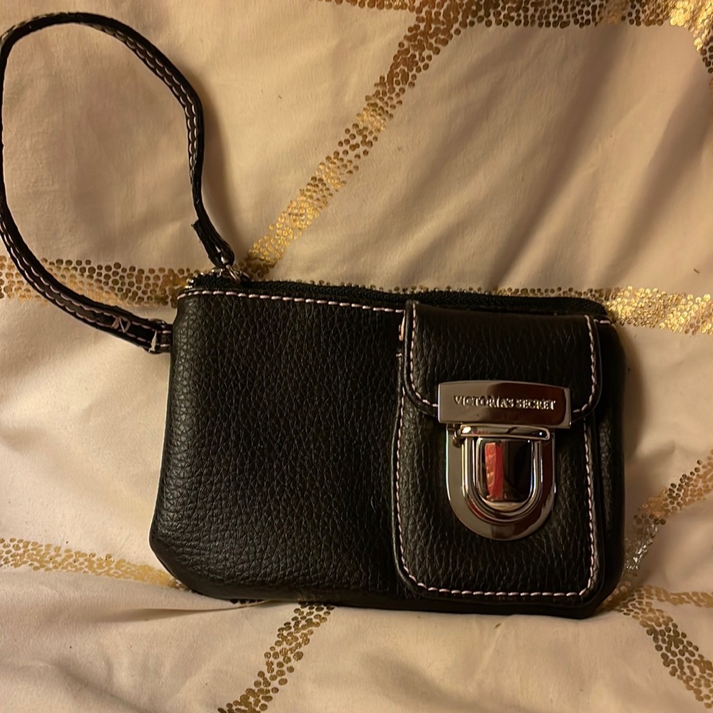 Victoria’s secret wristlet-like new. Has top zipper and small side pocket